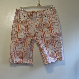 EXCELLENT CONDITION WOMEN’S SIZE 2 ATHLETA 11-1/2” COTTON STRETCH FLORAL SHORTS